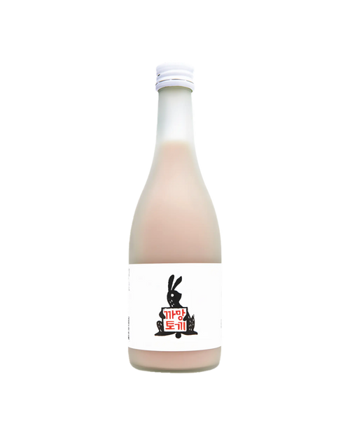 A frosted glass bottle filled with an opaque pale pink liquid (omija makgeolli), featuring a white label with a black rabbit illustration holding a red sign that reads 'Black Rabbit'.

Black Rabbit Makgeolli - Sulsaem - cultsool