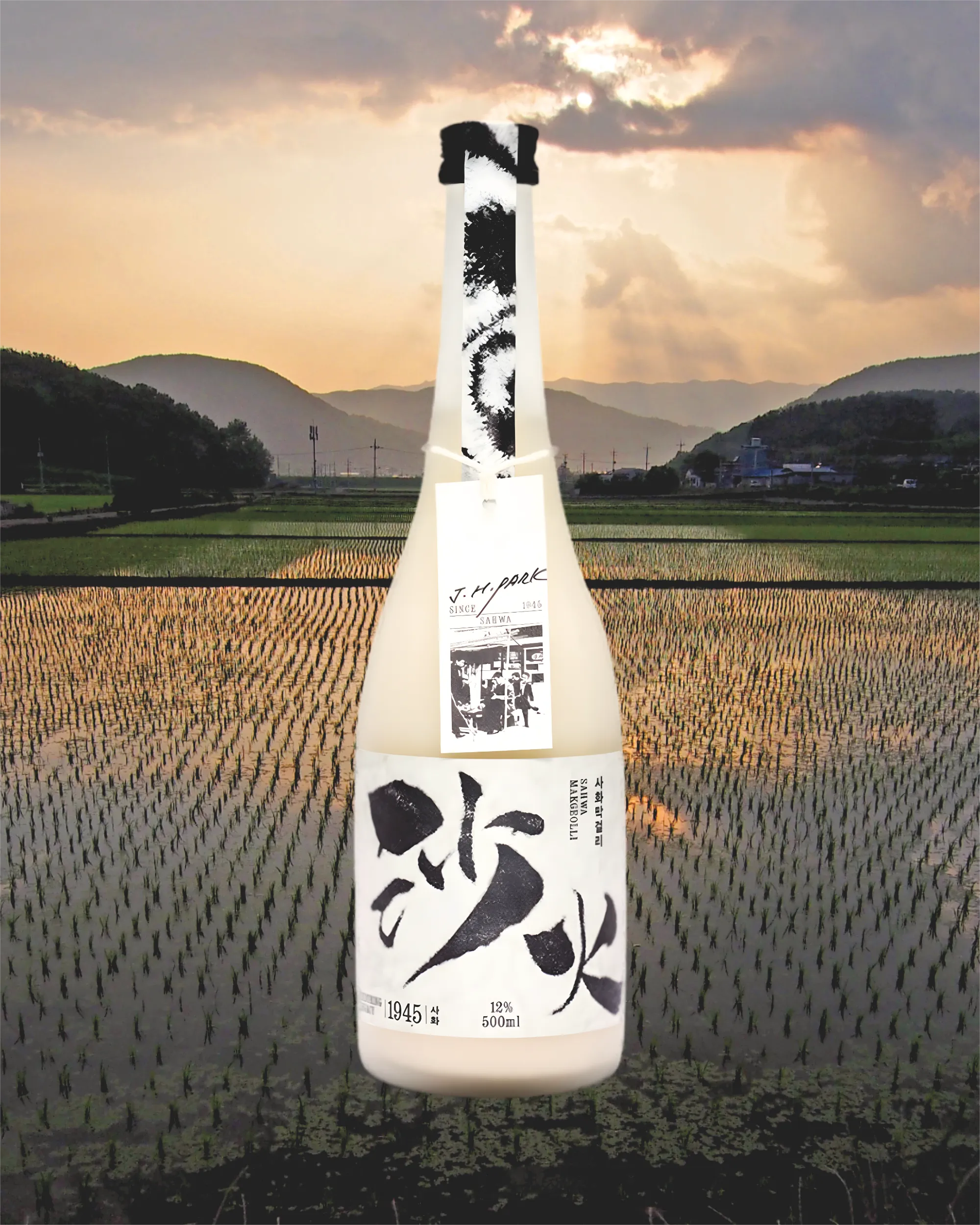 Elegant Korean rice wine (makgeolli) bottle with black and white design against a scenic background of rice fields and mountains at sunset.

Sahwa Makgeolli - Good Tomorrow Brewery - cultsool