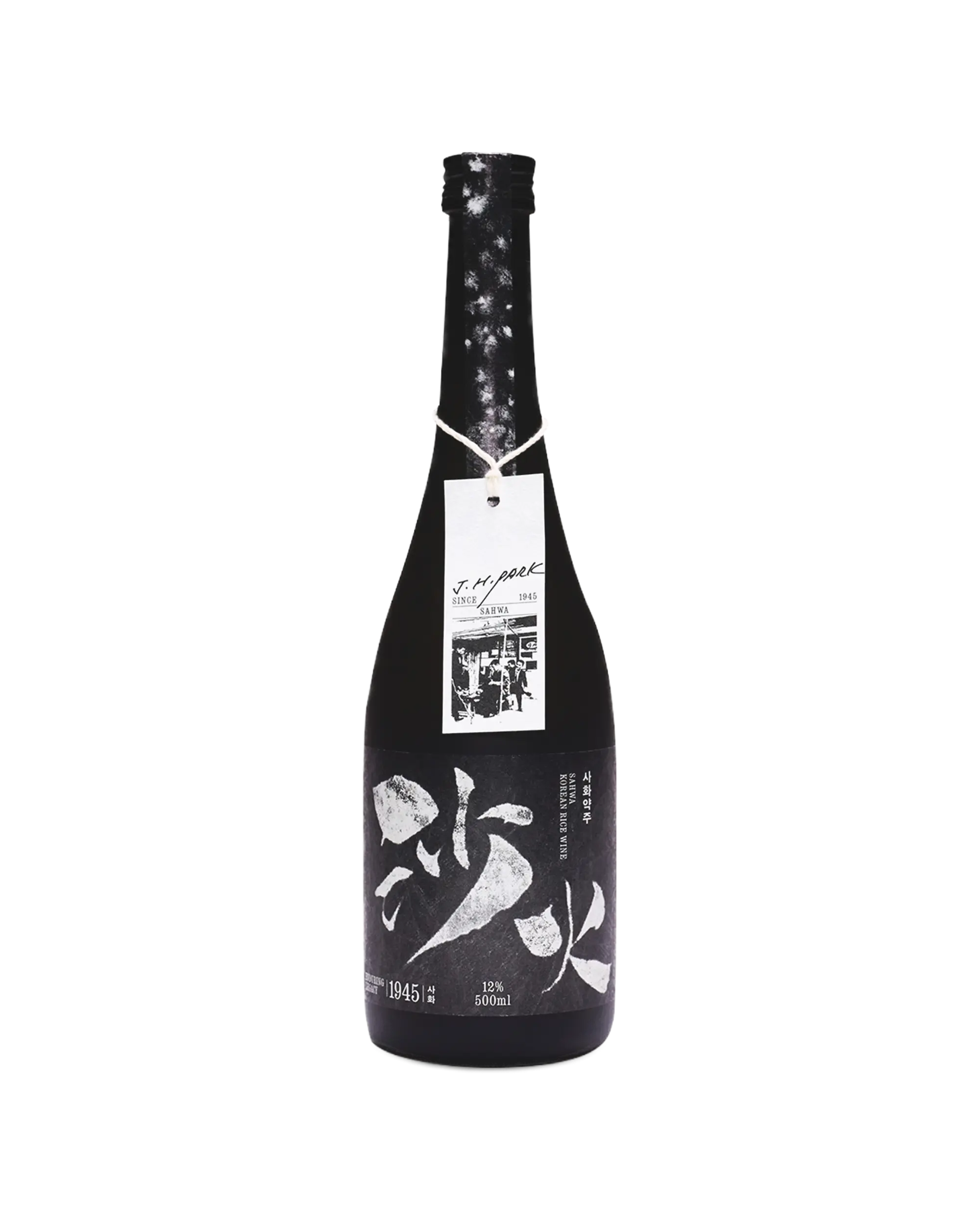 A single black bottle of Korean rice wine with white calligraphy on the label, a hanging white product tag, and a dark floral wrap, photographed against a plain white background. Sahwa Yakju - Good Tomorrow Brewery - cult