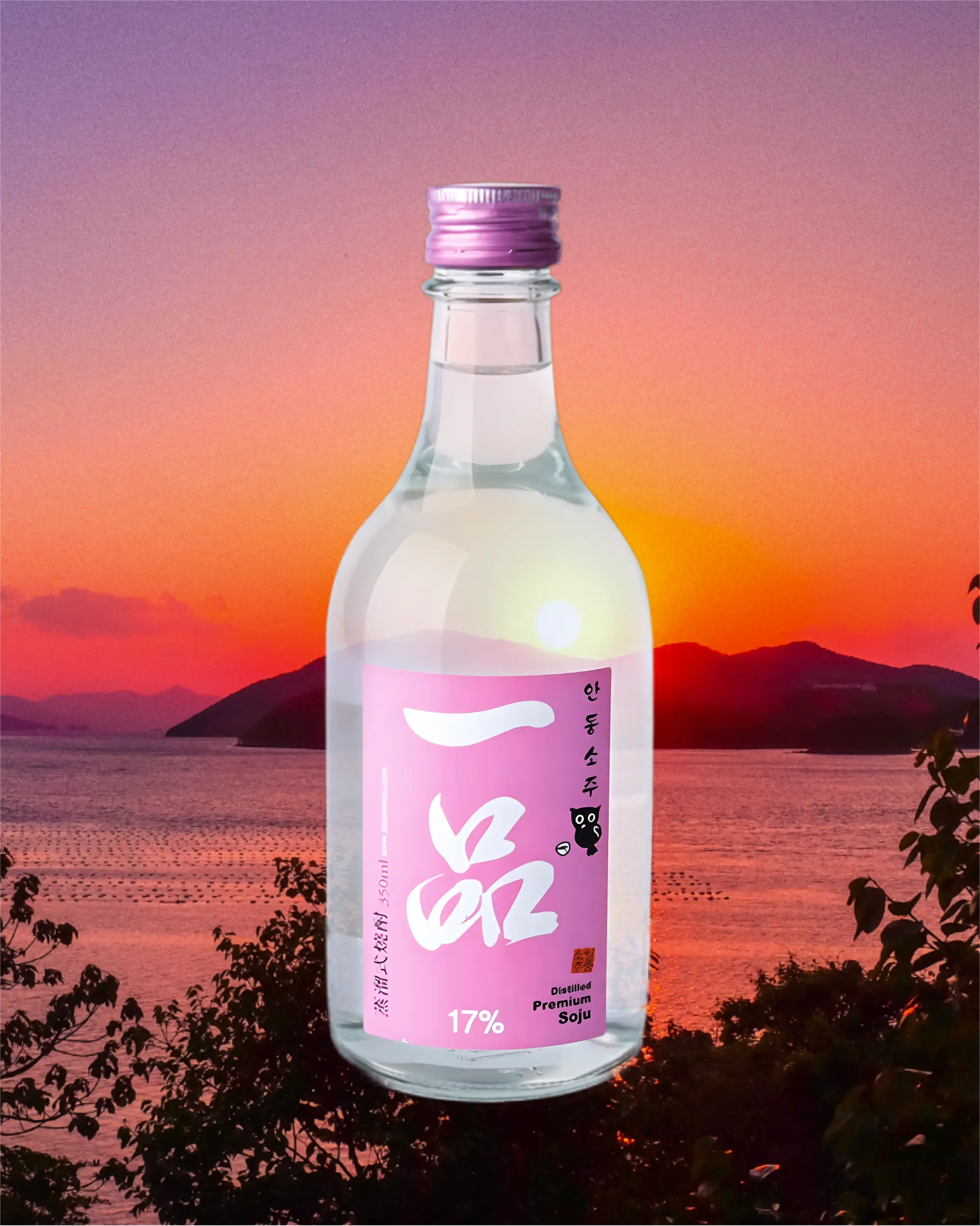 A clear glass bottle of Korean soju with a pink label with a sunset and mountain backdrop. Ilpoom Andong Soju 17% - distilled rice soju - cult 